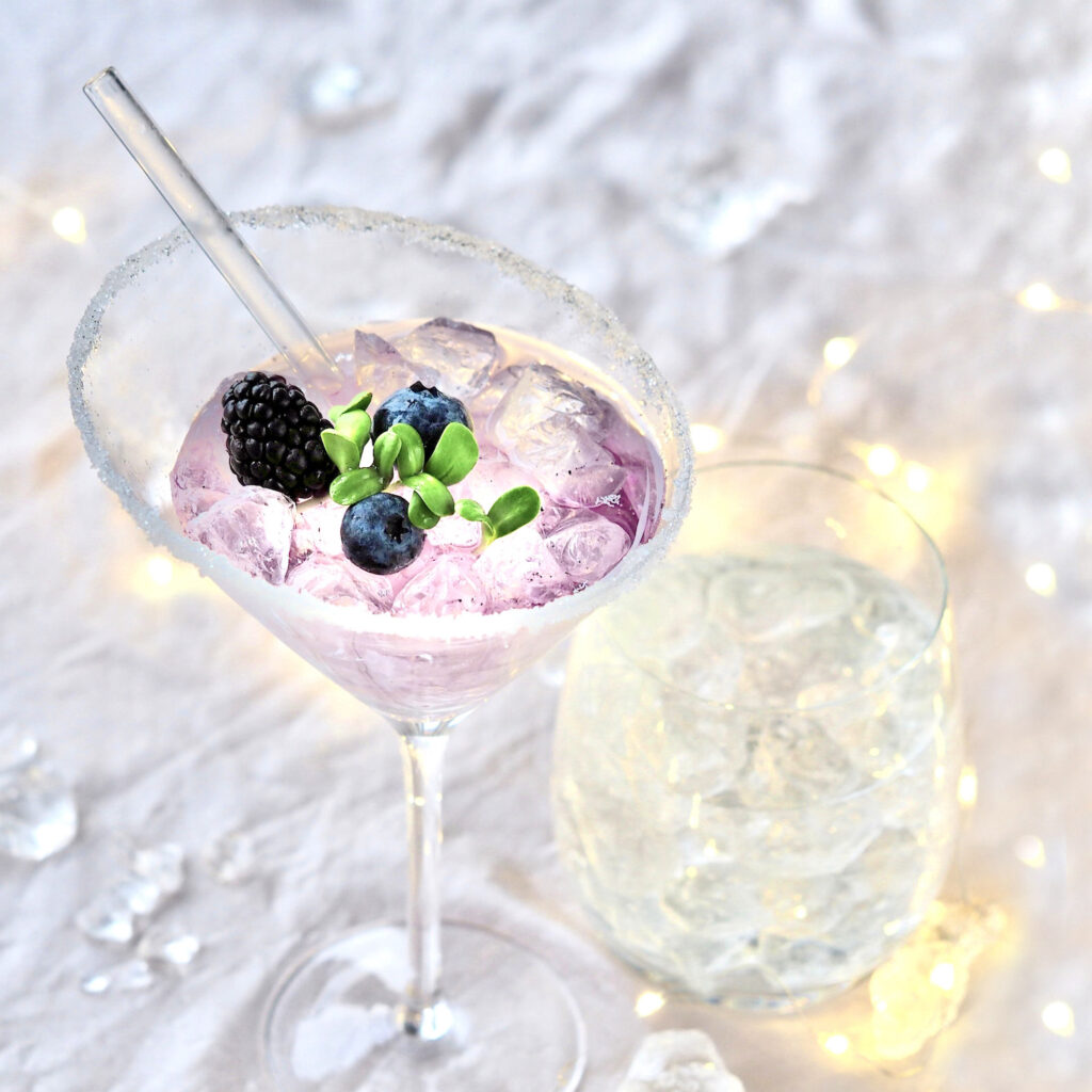 cocktail with fresh sprouts and berries